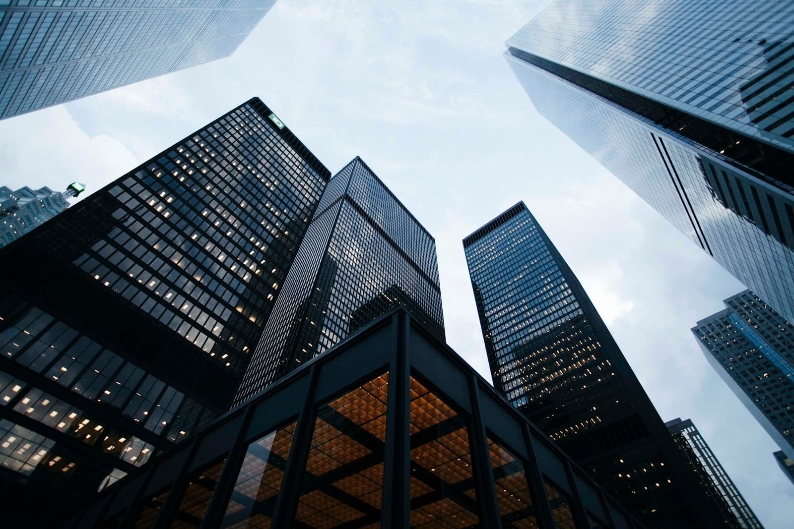 Glass facade of a modern commercial building against a clear sky